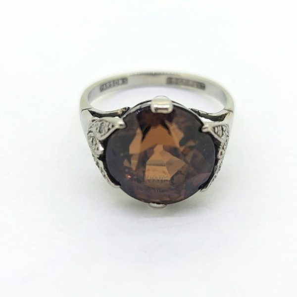 Vintage Brown Zircon Solitaire Engagement Ring, single stone brown zircon claw set in 18ct gold and platinum with diamond-set leaf-shaped shoulders
