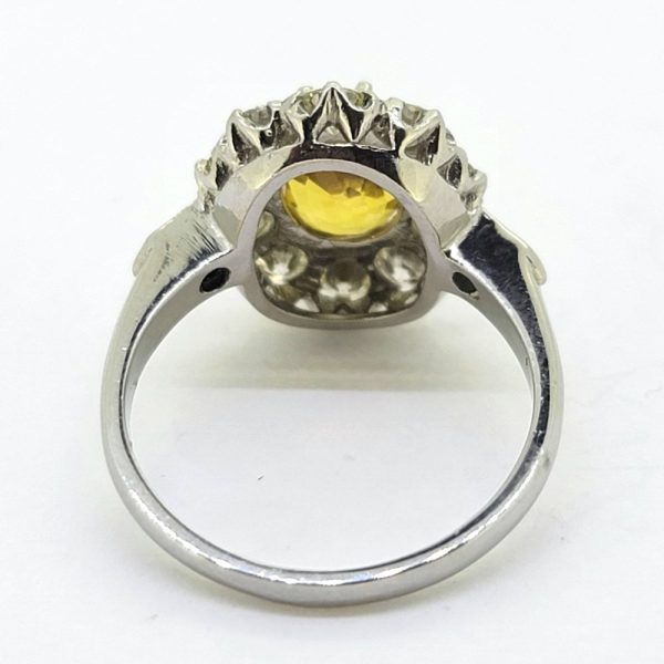 2.51ct Oval Yellow Sapphire and Diamond Cluster Engagement Ring in Platinum