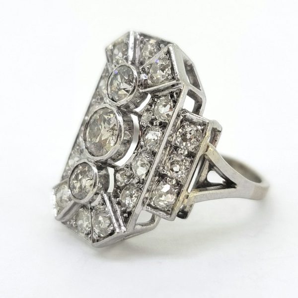 Art Deco Three Stone Diamond Cluster Panel Ring, decorative diamond tablet ring three diamonds within diamond panel surround with diamond stepped shoulders in 18ct white gold