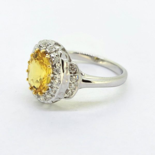 Decorative 2.1ct Oval Yellow Sapphire and Diamond Cluster Dress Ring with diamond stepped shoulders in 18ct white gold