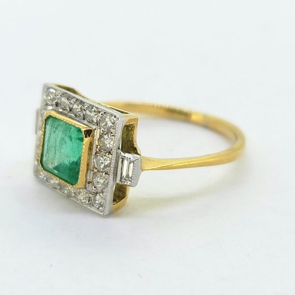 1.20ct Square Emerald and Diamond Cluster Engagement Ring, 1.20ct square-cut emerald surrounded by a border of diamonds with baguette-cut diamond to each shoulder in 18ct yellow and white gold