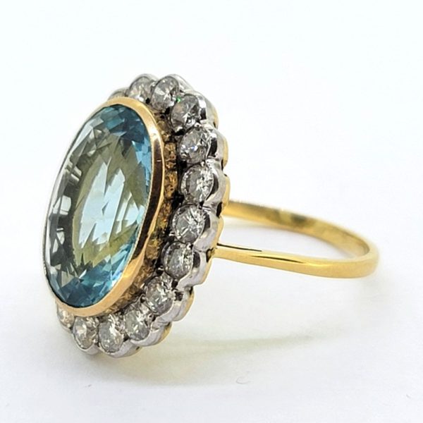 7.98ct Oval Aquamarine and Diamond Cluster Ring