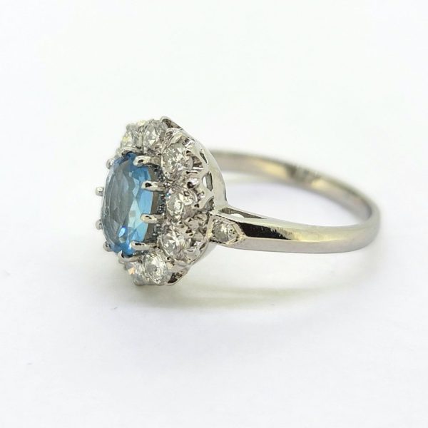 0.80ct Oval Aquamarine and Diamond Crown Cluster Engagement Ring