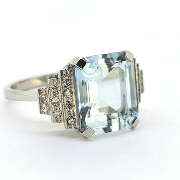 5ct Aquamarine Ring with Diamond Stepped Shoulders in Platinum, 5ct step-cut aquamarine flanked by graduated stepped shoulders studded with sparkling diamonds