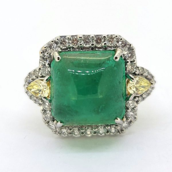 Certified 9.42ct Sugarloaf Colombian Emerald and Diamond Cluster Cocktail Ring, sugarloaf-cut Colombian emerald flanked by pear-cut fancy yellow diamonds within border of sparkling white diamonds in 18ct white gold