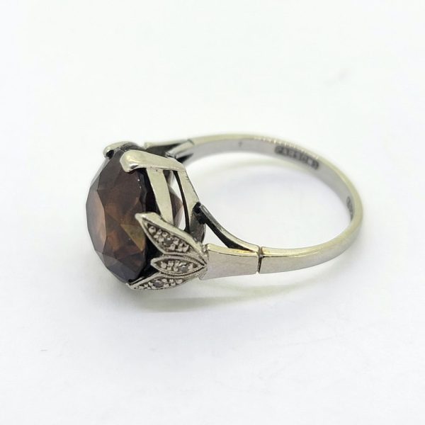 Vintage Brown Zircon Solitaire Engagement Ring, single stone brown zircon claw set in 18ct gold and platinum with diamond-set leaf-shaped shoulders
