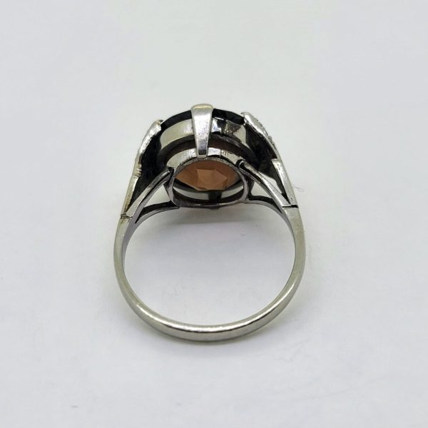 Vintage Brown Zircon Solitaire Engagement Ring, single stone brown zircon claw set in 18ct gold and platinum with diamond-set leaf-shaped shoulders