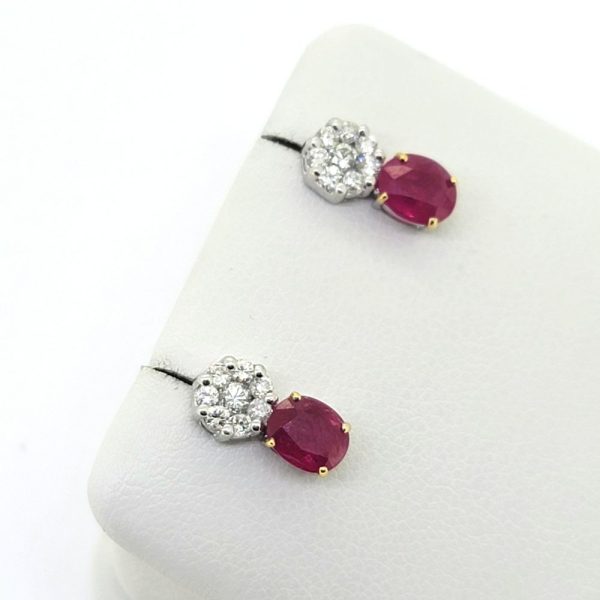 1.30ct Oval Ruby and Diamond Cluster Drop Earrings, oval rubies suspended underneath diamond cluster tops in 14ct white gold