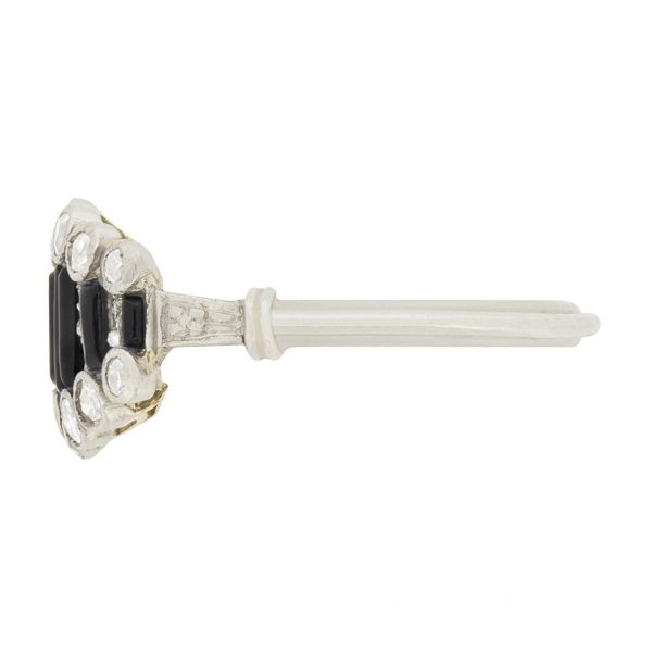 Art Deco Old Cut Diamond and Onyx Ring in Platinum, alternating bands of old-cut diamonds and black onyx with a decorative reeded band. Circa 1920s