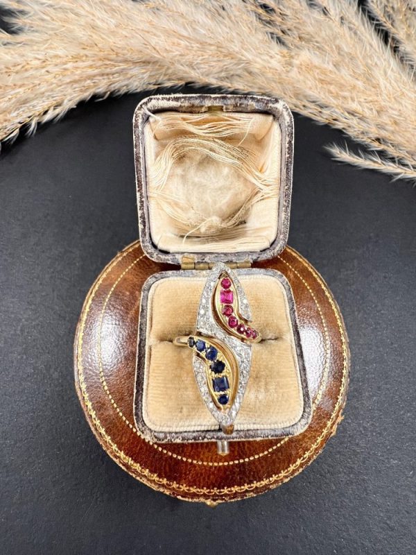 Vintage Ruby Sapphire Diamond Double Head Snake Navette Cluster Ring, marquise shaped diamond cluster ring with ruby and sapphire snake heads in 14ct gold. Circa 1950s
