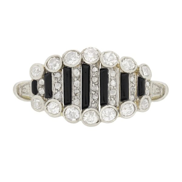 Art Deco Old Cut Diamond and Onyx Ring in Platinum, alternating bands of old-cut diamonds and black onyx with a decorative reeded band. Circa 1920s
