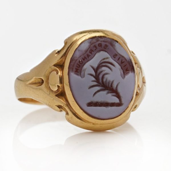 Victorian gold signet ring with an intaglio carved oval sardonyx.