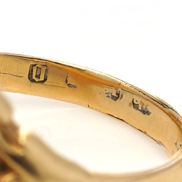 Victorian gold signet ring with an intaglio carved oval sardonyx.