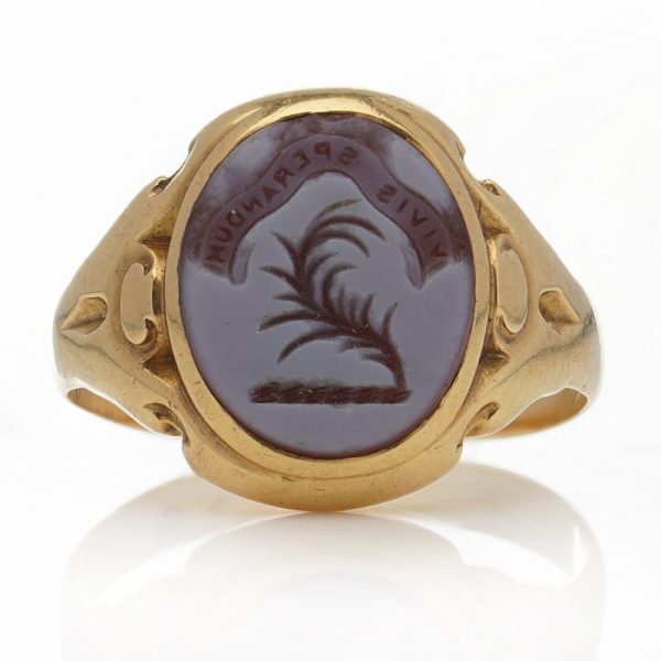 Victorian gold signet ring with an intaglio carved oval sardonyx.