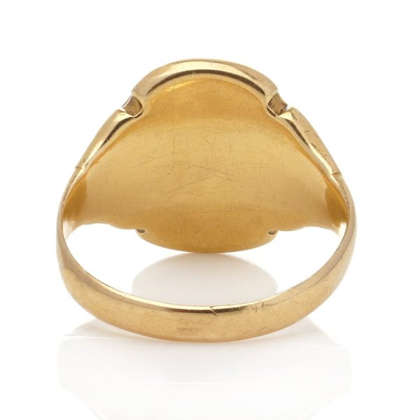 Victorian gold signet ring with an intaglio carved oval sardonyx.