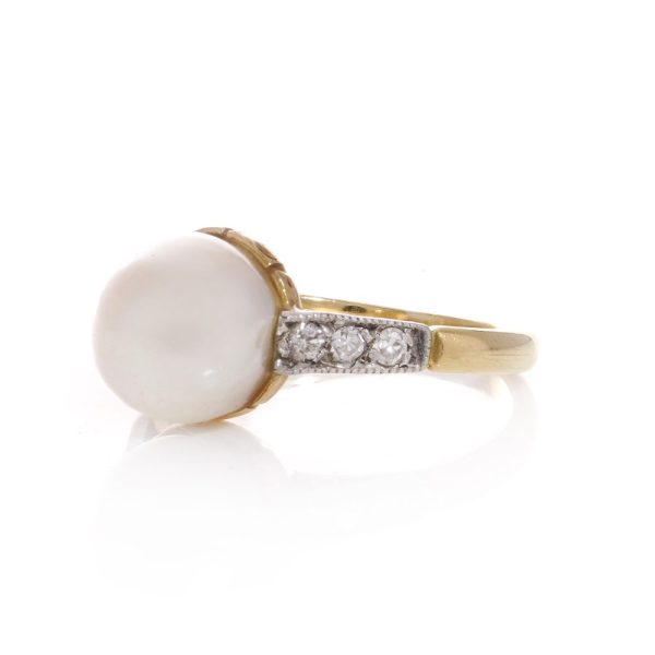 Vintage gold and palladium pearl and diamond ring.