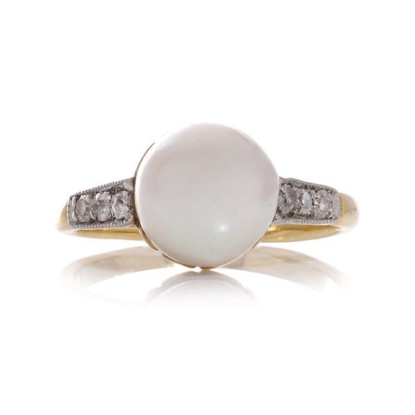 Vintage gold and palladium pearl and diamond ring.