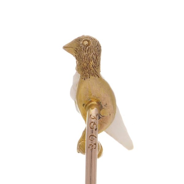 Victorian gold bird shape stick pin with pearl and ruby.