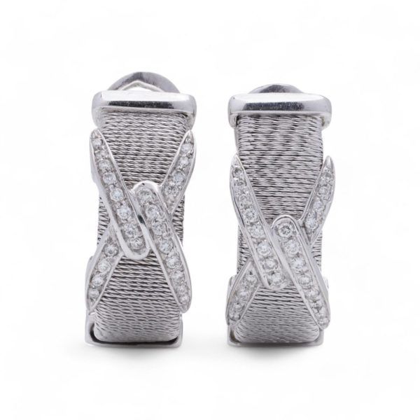 Vintage Kutchinsky diamond earrings in white gold.