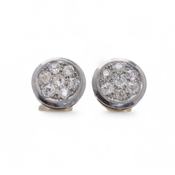 Edwardian old cut diamond stud earrings in platinum and gold.