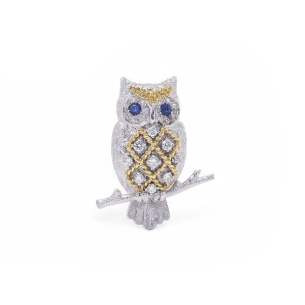 Vintage Diamond owl brooch with sapphire eyes in white and yellow gold.