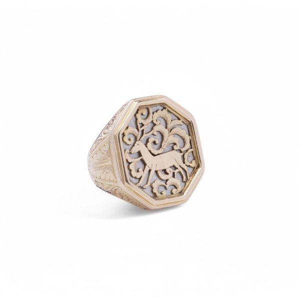 Gold stag signet ring.