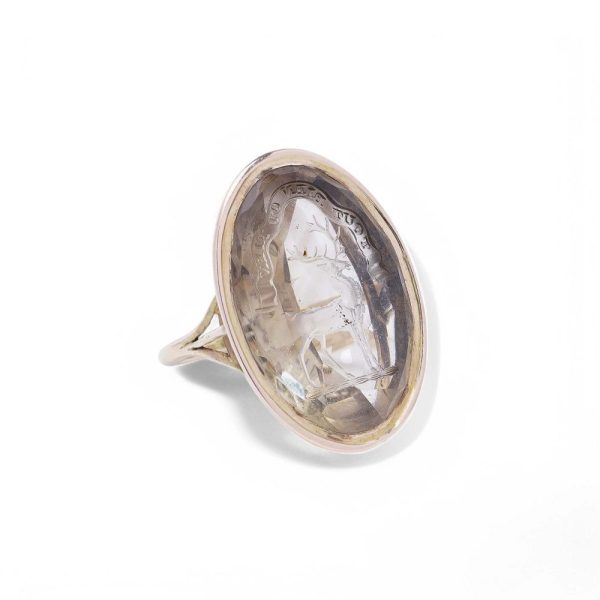 Rock crystal intaglio signet ring in gold.