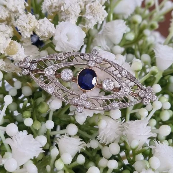 Edwardian Antique 1ct Sapphire and 1.10ct Old Cut Diamond Navette Brooch in 18ct Yellow Gold and Platinum, Circa 1900