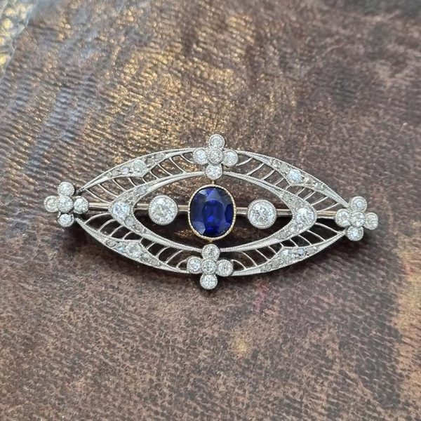 Edwardian Antique 1ct Sapphire and 1.10ct Old Cut Diamond Navette Brooch in 18ct Yellow Gold and Platinum, Circa 1900