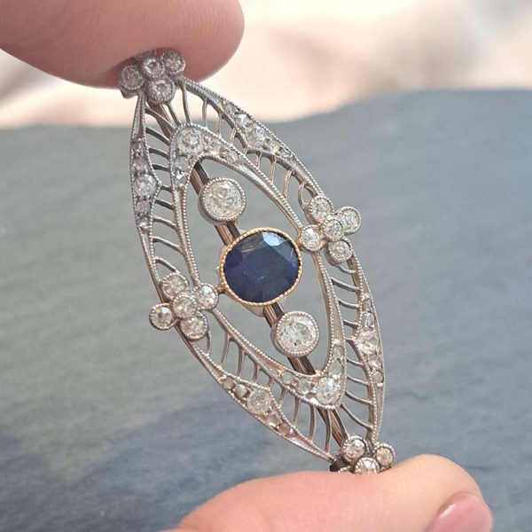 Edwardian Antique 1ct Sapphire and 1.10ct Old Cut Diamond Navette Brooch in 18ct Yellow Gold and Platinum, Circa 1900