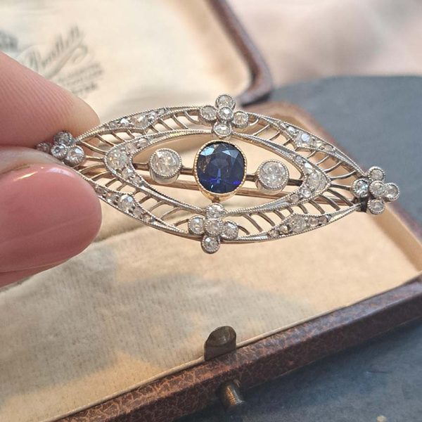Edwardian Antique 1ct Sapphire and 1.10ct Old Cut Diamond Navette Brooch in 18ct Yellow Gold and Platinum, Circa 1900
