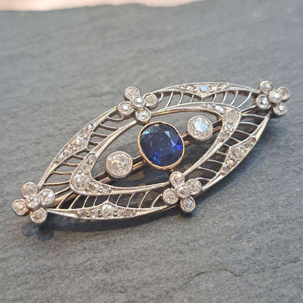 Edwardian Antique 1ct Sapphire and 1.10ct Old Cut Diamond Navette Brooch in 18ct Yellow Gold and Platinum, Circa 1900