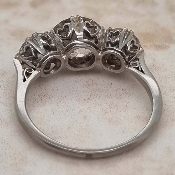 Antique Diamond Three Stone Trilogy Engagement Ring in Platinum, 3.21 carats, 2.01ct old European cut diamond flanked by 1.20cts diamonds with certificate