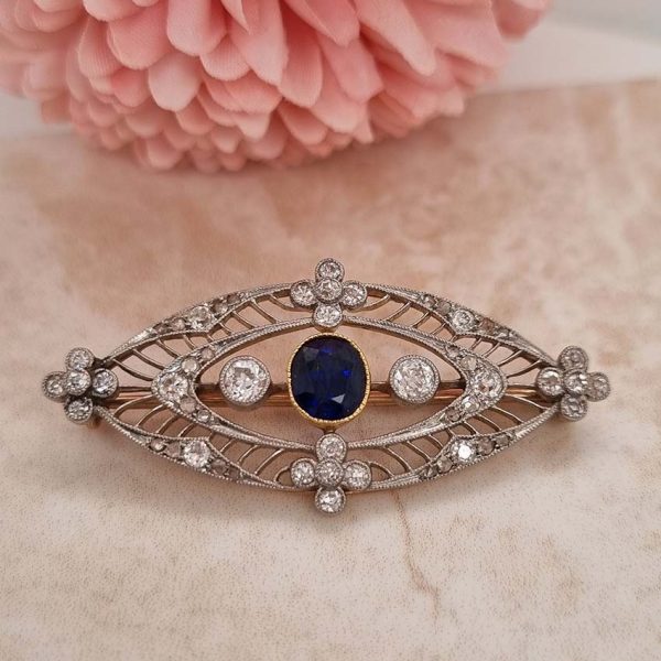 Edwardian Antique 1ct Sapphire and 1.10ct Old Cut Diamond Navette Brooch in 18ct Yellow Gold and Platinum, Circa 1900