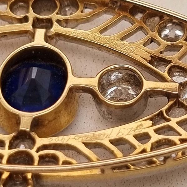 Edwardian Antique 1ct Sapphire and 1.10ct Old Cut Diamond Navette Brooch in 18ct Yellow Gold and Platinum, Circa 1900