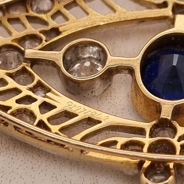 Edwardian Antique 1ct Sapphire and 1.10ct Old Cut Diamond Navette Brooch in 18ct Yellow Gold and Platinum, Circa 1900