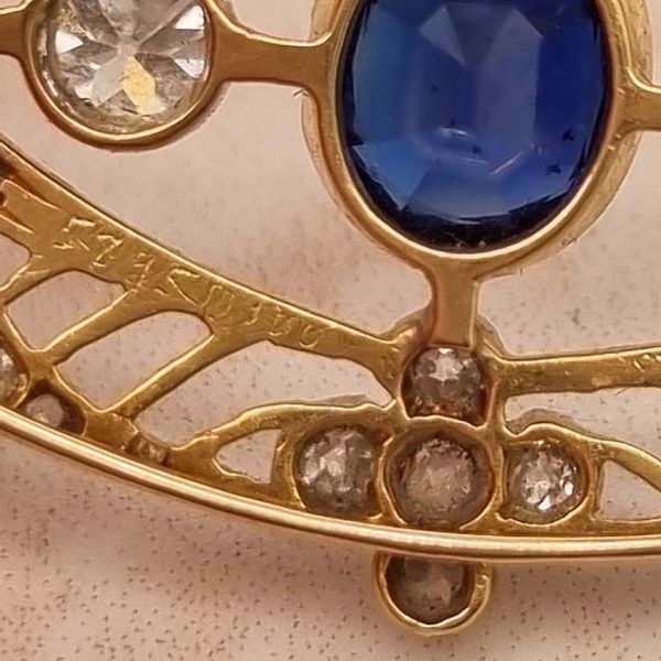 Edwardian Antique 1ct Sapphire and 1.10ct Old Cut Diamond Navette Brooch in 18ct Yellow Gold and Platinum, Circa 1900