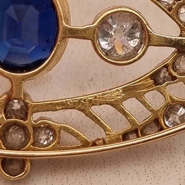 Edwardian Antique 1ct Sapphire and 1.10ct Old Cut Diamond Navette Brooch in 18ct Yellow Gold and Platinum, Circa 1900
