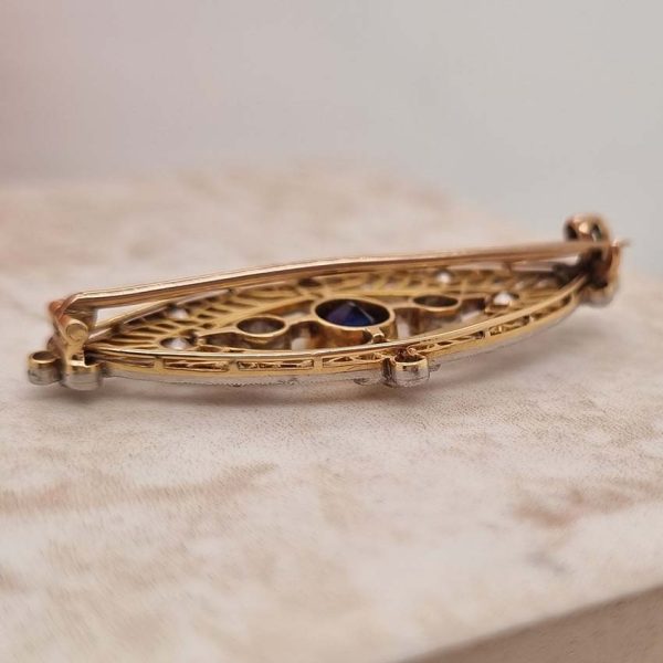Edwardian Antique 1ct Sapphire and 1.10ct Old Cut Diamond Navette Brooch in 18ct Yellow Gold and Platinum, Circa 1900