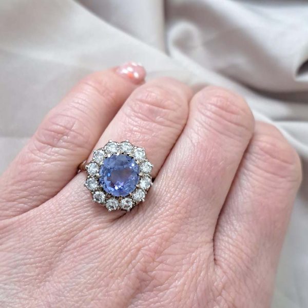 Antique Art Deco 4.50ct Cornflower Blue Ceylon Sapphire and 1.20ct Diamond Cluster Engagement Ring in 18ct white and yellow gold. Circa 1920