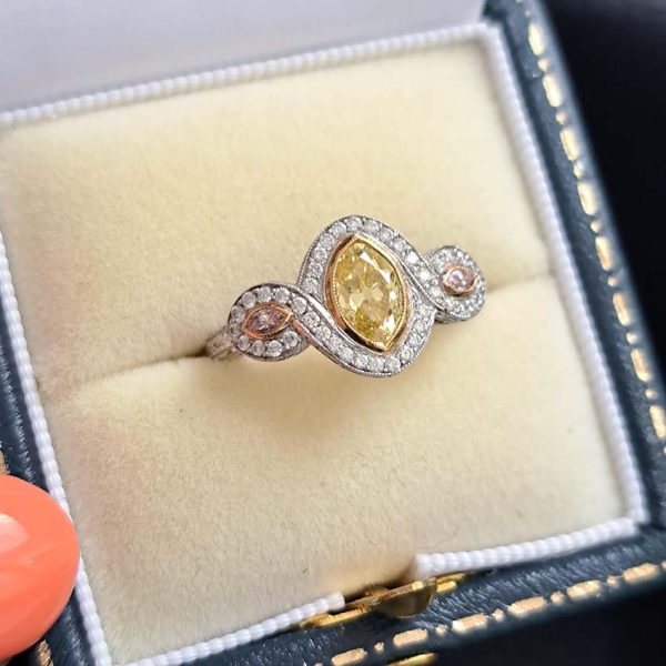GIA Certified 0.72ct Fancy Vivid Yellow and Pink Marquise Diamond Trilogy Cluster Engagement Ring in Platinum by Hancocks