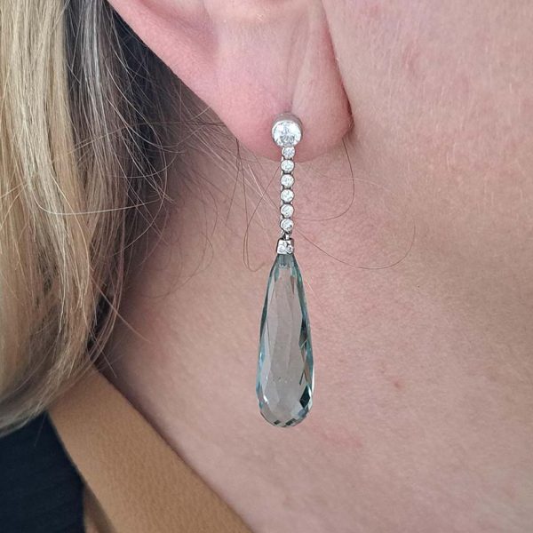 Briolette Aquamarine and Diamond Long Drop Earrings, elongated pear-shaped briolette-cut aquamarines of a blue-green colour suspended from diamond line tops