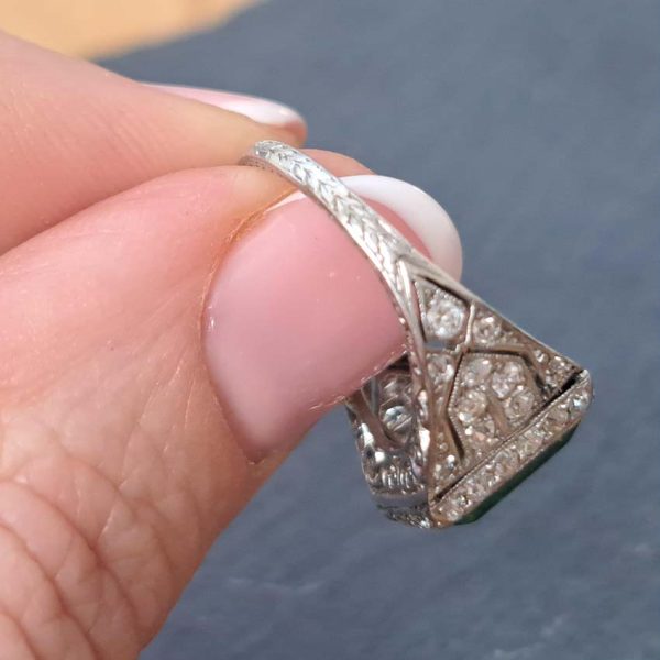 Belle Epoque Edwardian Antique 2.10ct Emerald and Diamond Cluster Ring in Platinum, 2.10ct rectangular step-cut vivid green emerald in diamond mount with openwork design to shoulders and scrolling gallery with engraved shank. Circa 1900