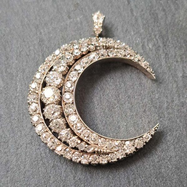 Victorian Antique Old Cut Diamond Crescent Moon Pendant, set with graduating rows of old-cut diamonds in silver-upon-gold, Circa 1890