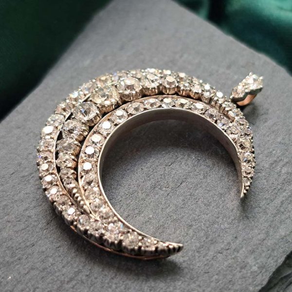 Victorian Antique Old Cut Diamond Crescent Moon Pendant, set with graduating rows of old-cut diamonds in silver-upon-gold, Circa 1890