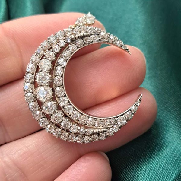 Victorian Antique Old Cut Diamond Crescent Moon Pendant, set with graduating rows of old-cut diamonds in silver-upon-gold, Circa 1890
