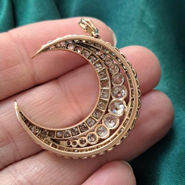 Victorian Antique Old Cut Diamond Crescent Moon Pendant, set with graduating rows of old-cut diamonds in silver-upon-gold, Circa 1890