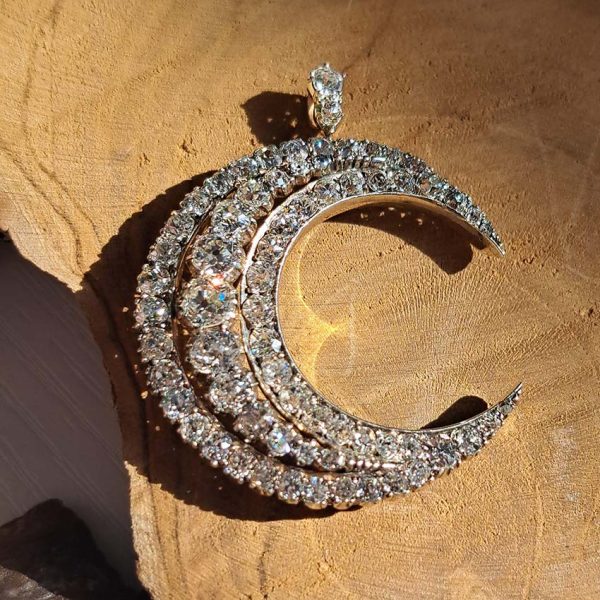 Victorian Antique Old Cut Diamond Crescent Moon Pendant, set with graduating rows of old-cut diamonds in silver-upon-gold, Circa 1890
