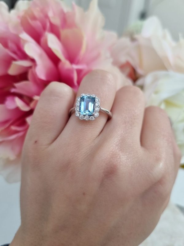 Aquamarine and diamond cluster ring set in 18ct white gold