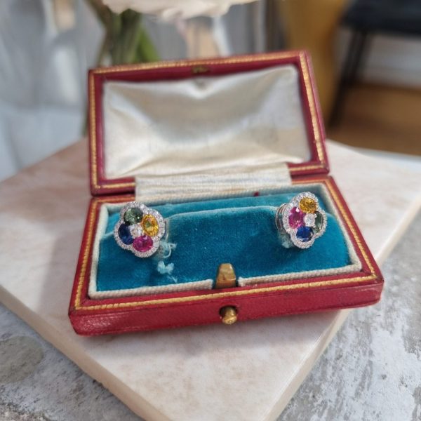 Fancy sapphire and diamond cluster earrings set in 18ct white gold